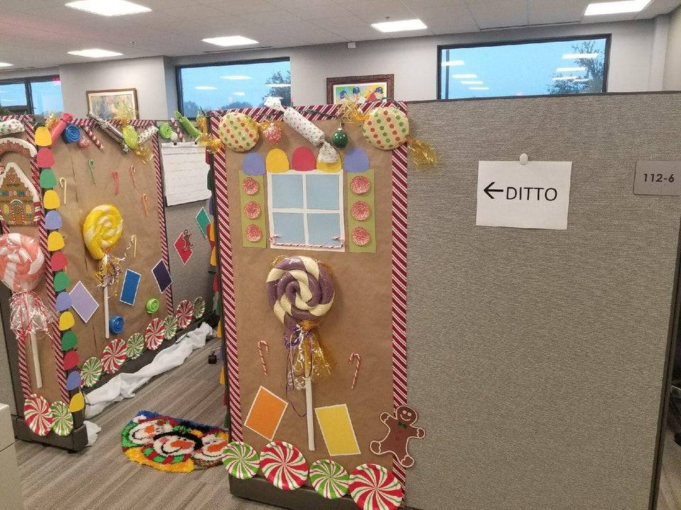 Christmas decorated cubicle and sign that says ditto beside it.