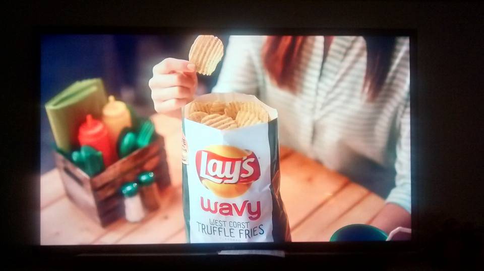 Lays advertisement featuring full bag of wavy chips