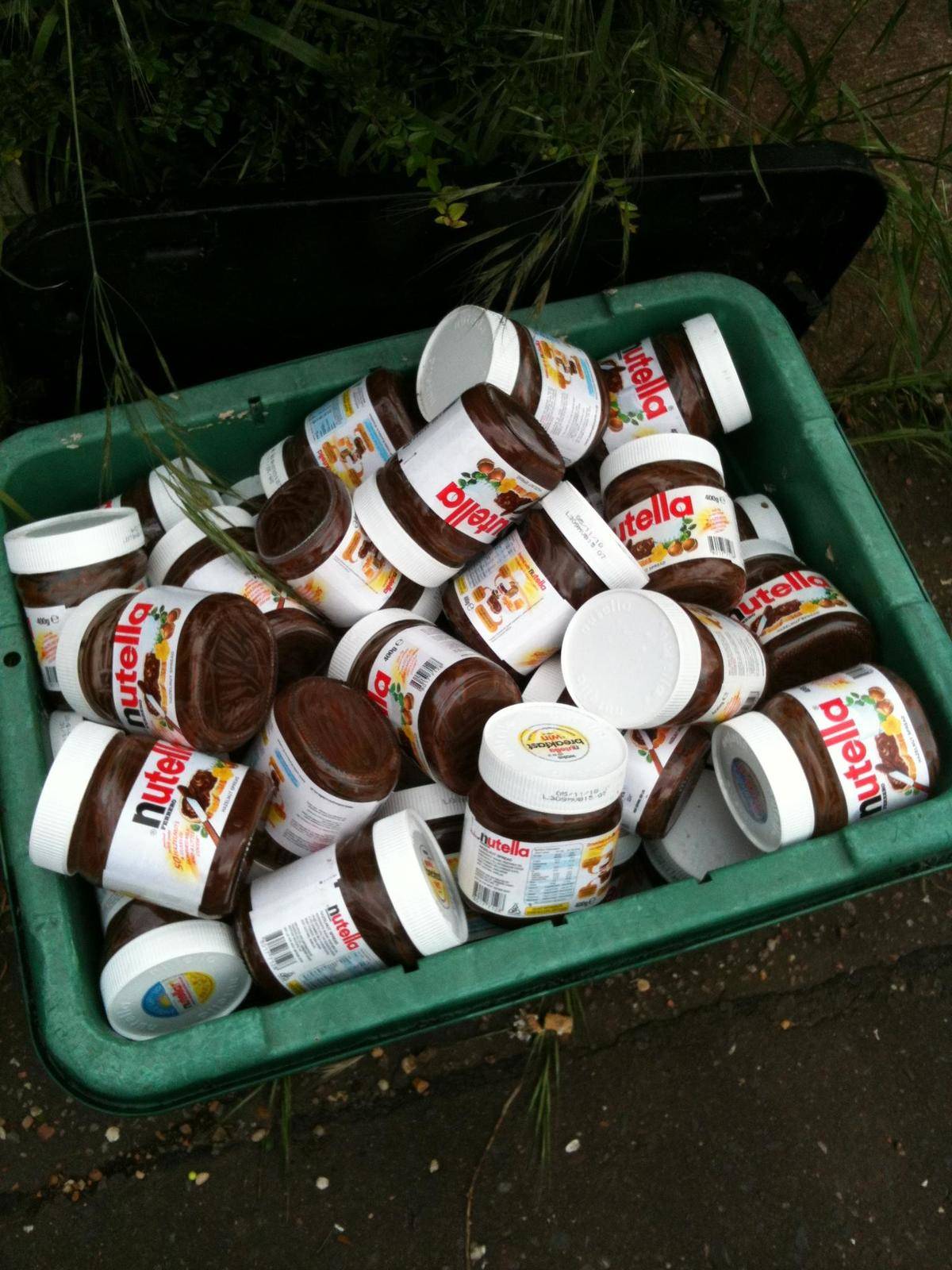 Recycling bin filled with nutella.