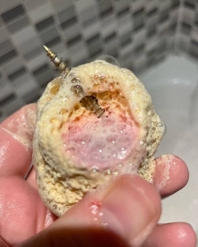 Bath bomb with a nail in it.