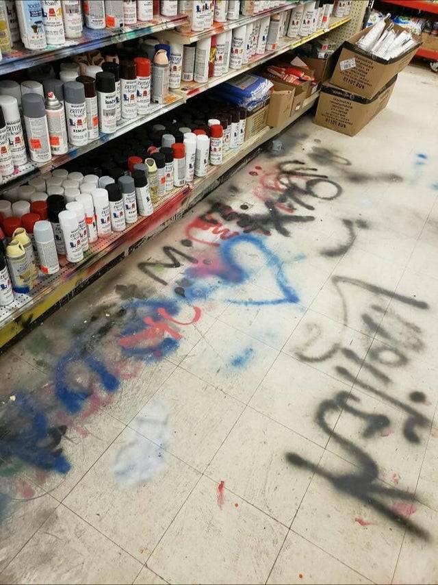 A hardware store floor covered in spray paint.