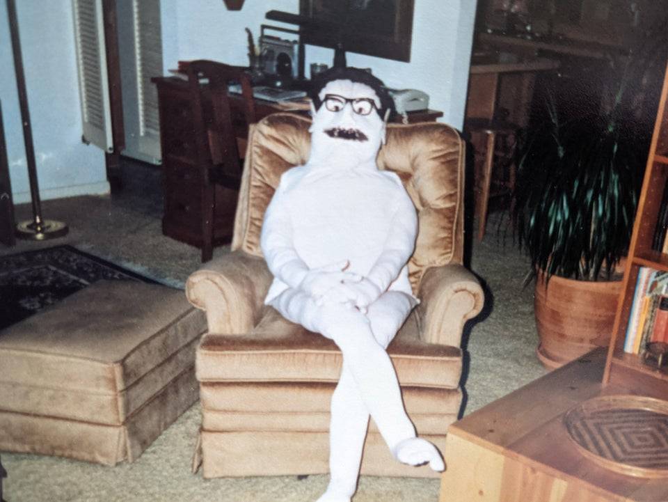 Life size human made out of blankets