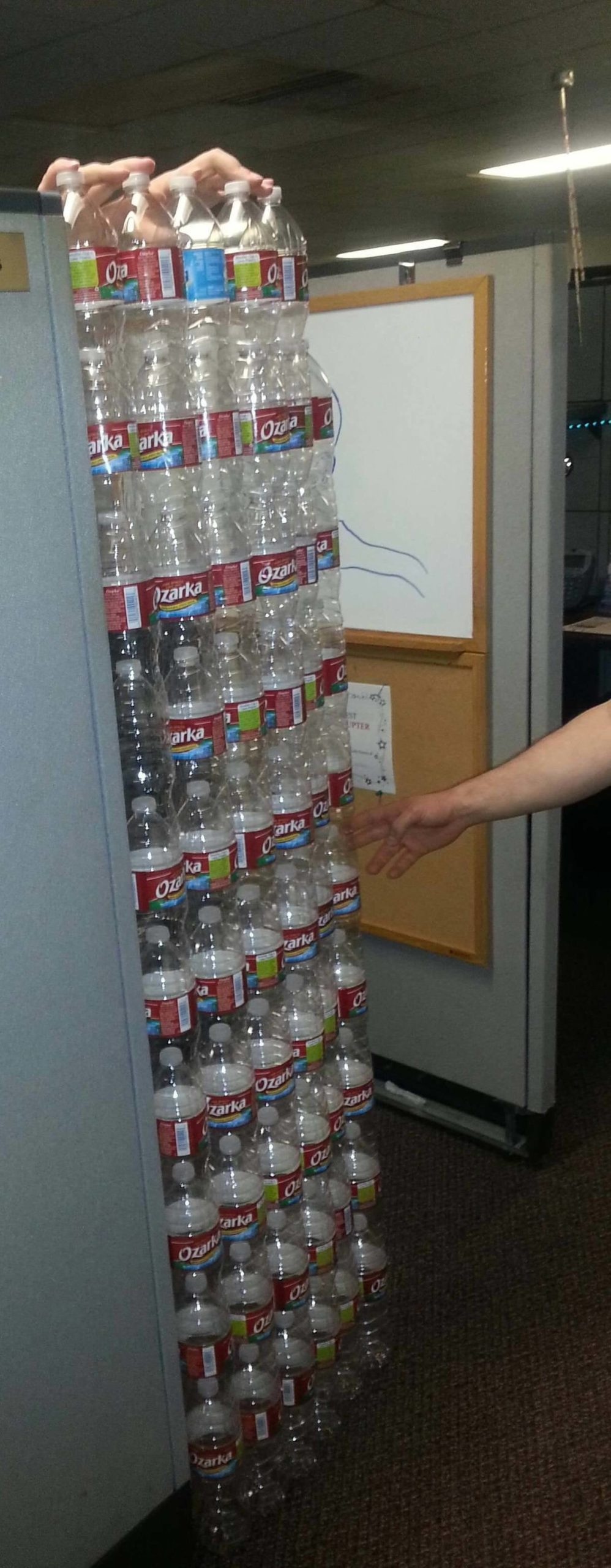 Cubicle with a water bottle door