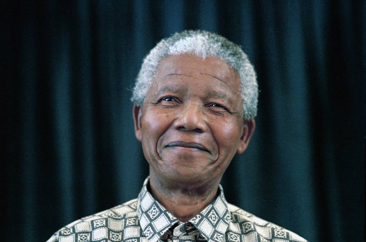A smiling Nelson Mandela.