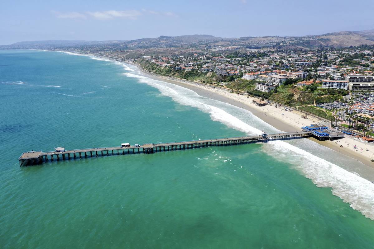 People enjoy a day at the beach