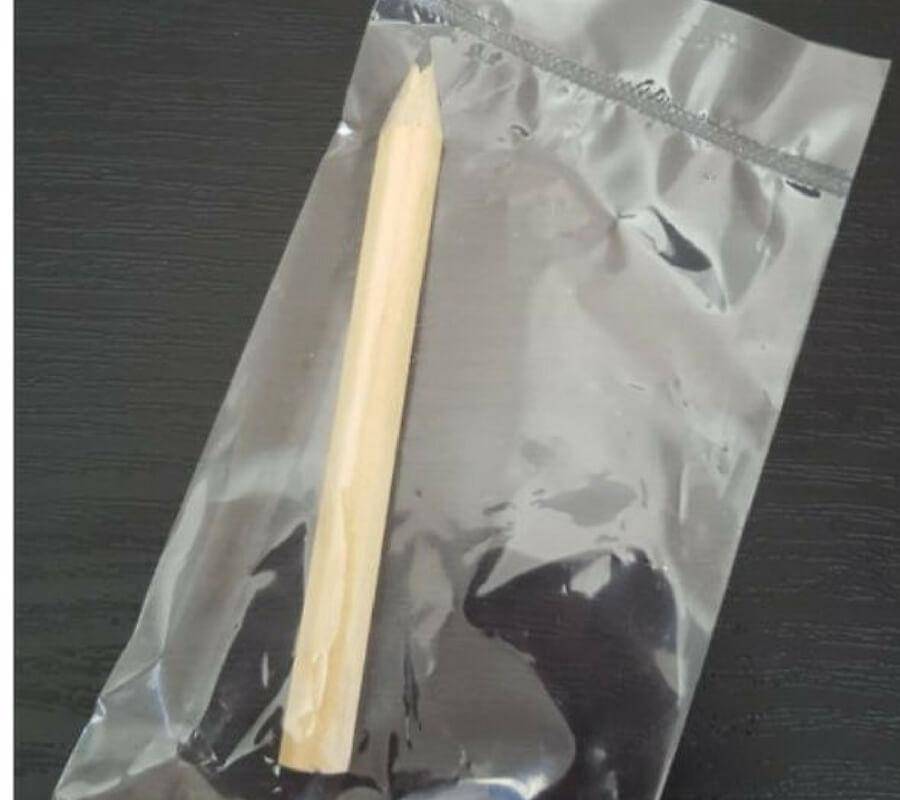 wooden golf pencil vacuum sealed in packaging