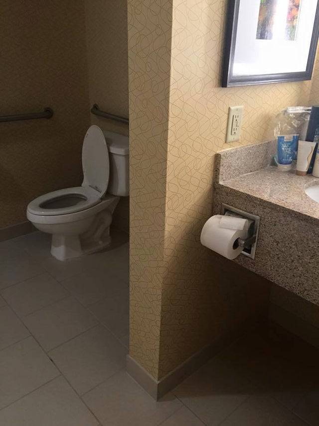 toilet paper too far from toilet