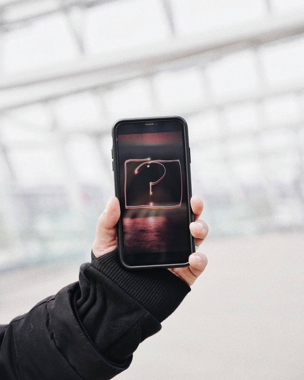 Phone with a question mark on its screen