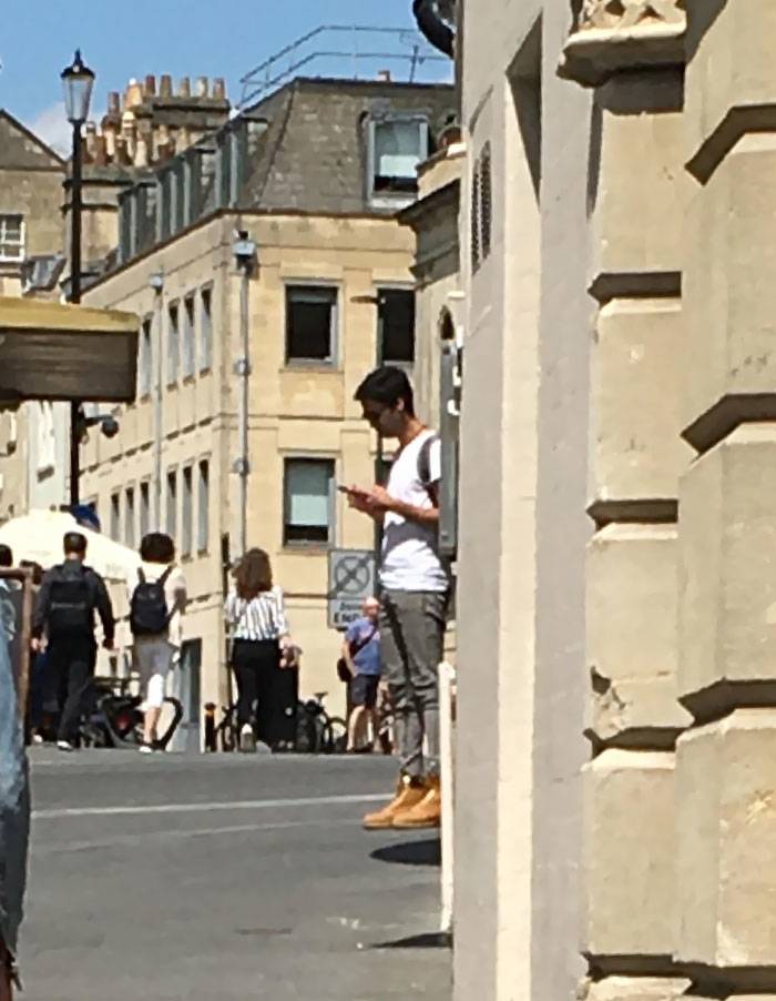 floating man on street in timbs
