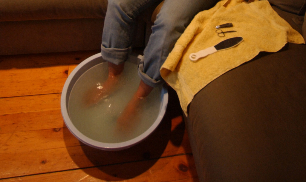 Person's feet in bath soak