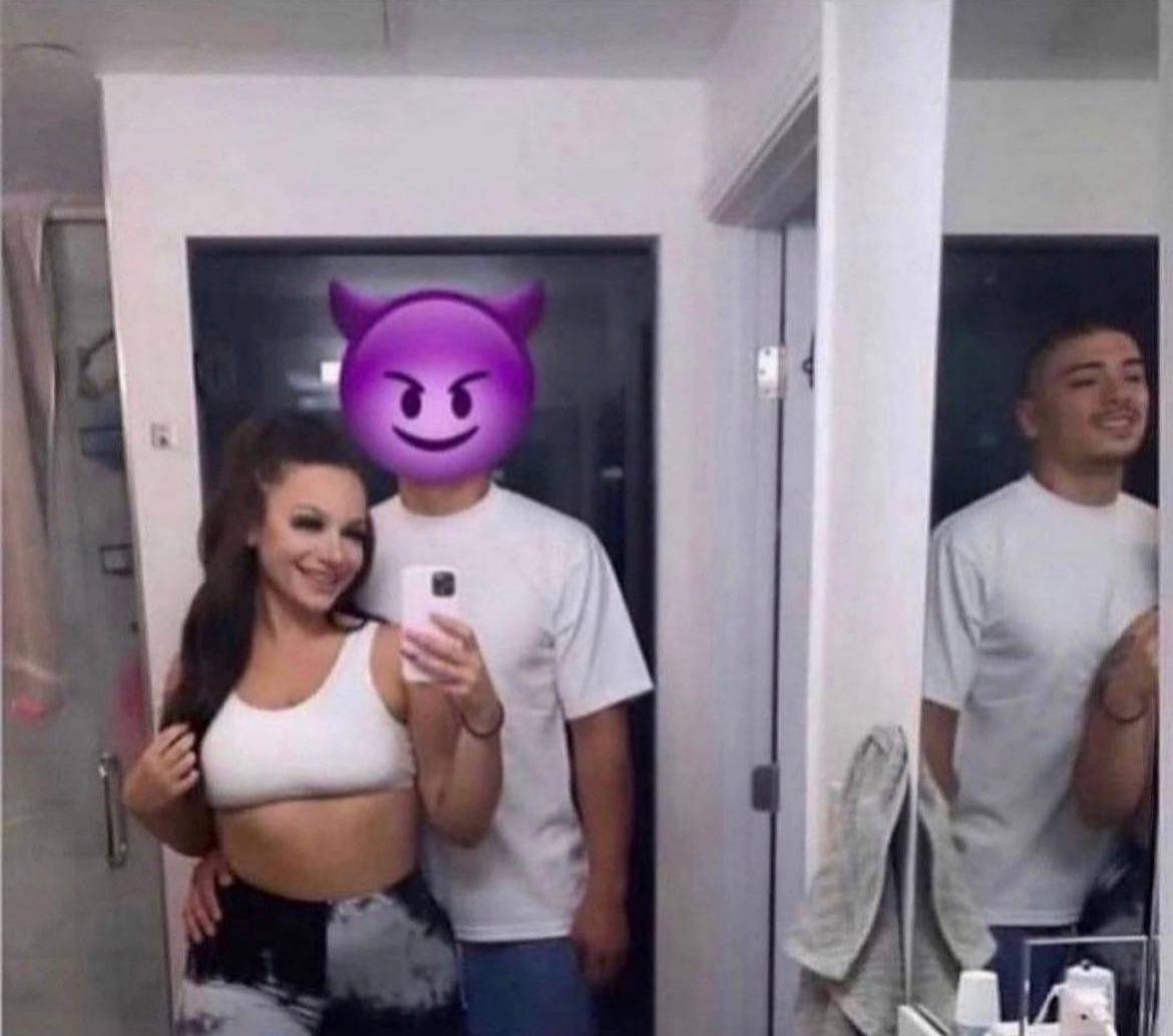 mirror selfie but she hid his face and forgot to hide his reflection