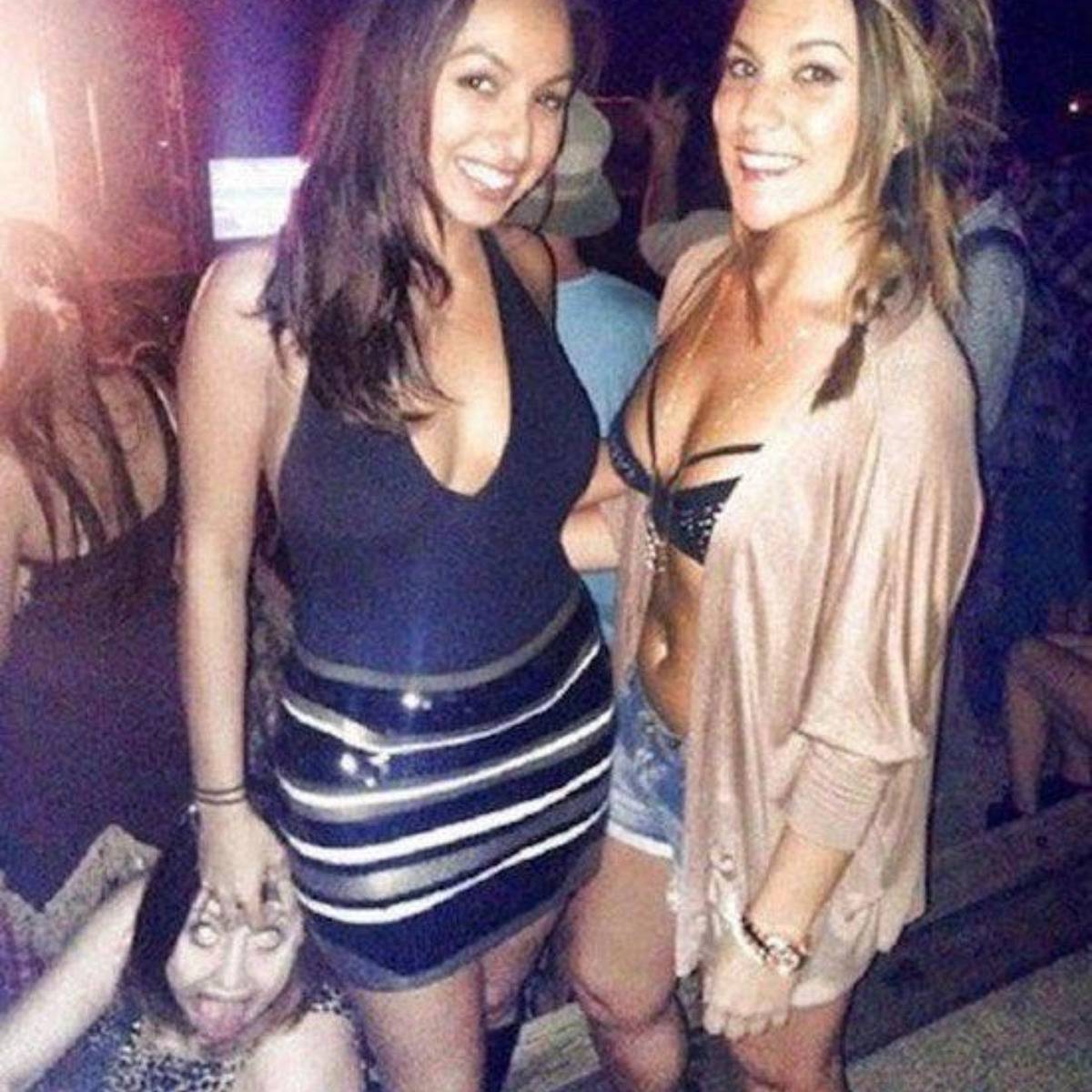 picture of women in club and girl in the background is making a scary face