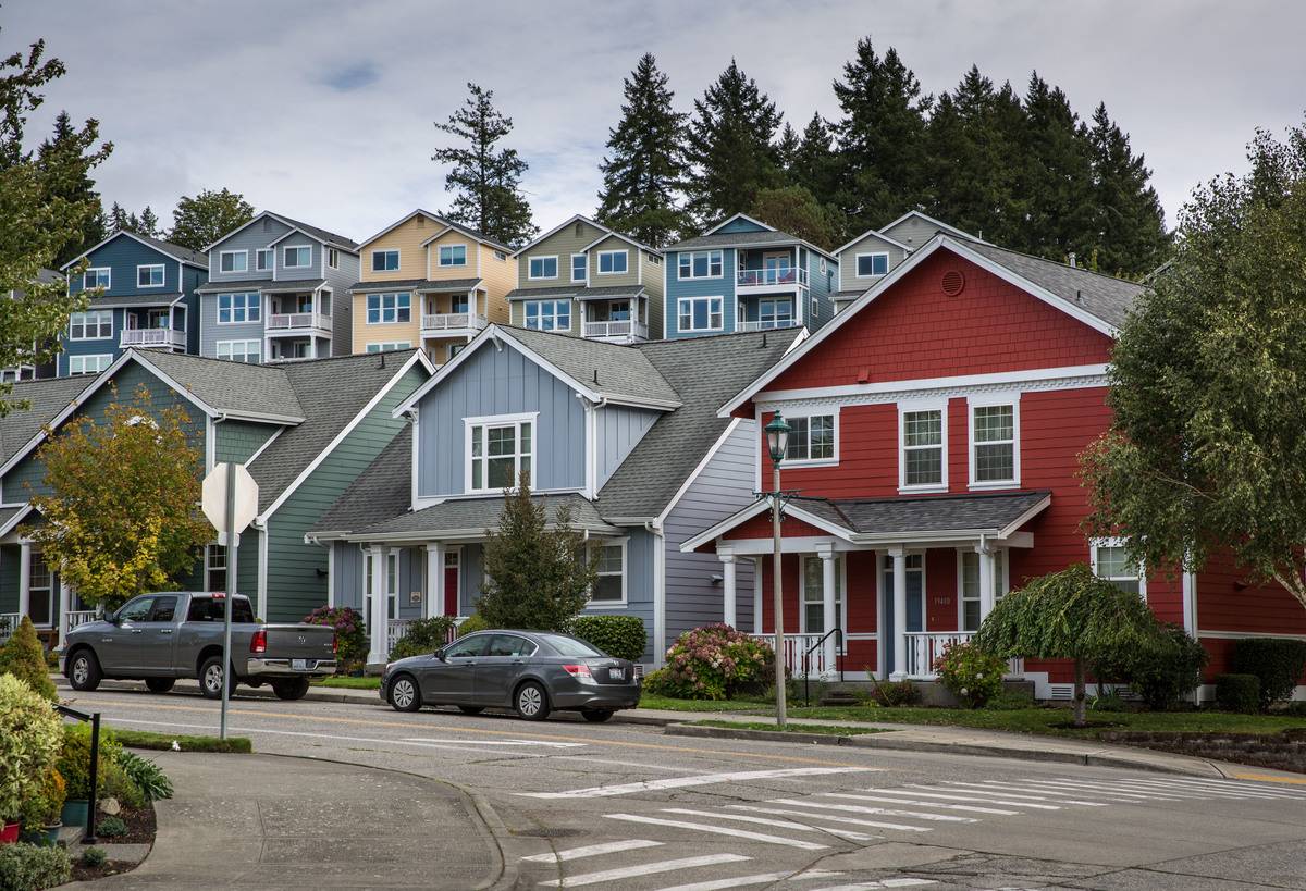 POULSBO, WA - SEPTEMBER 21: Colorfully painted homes in a neighborhood are viewed on September 21, 2021, in Poulsbo, Washington.