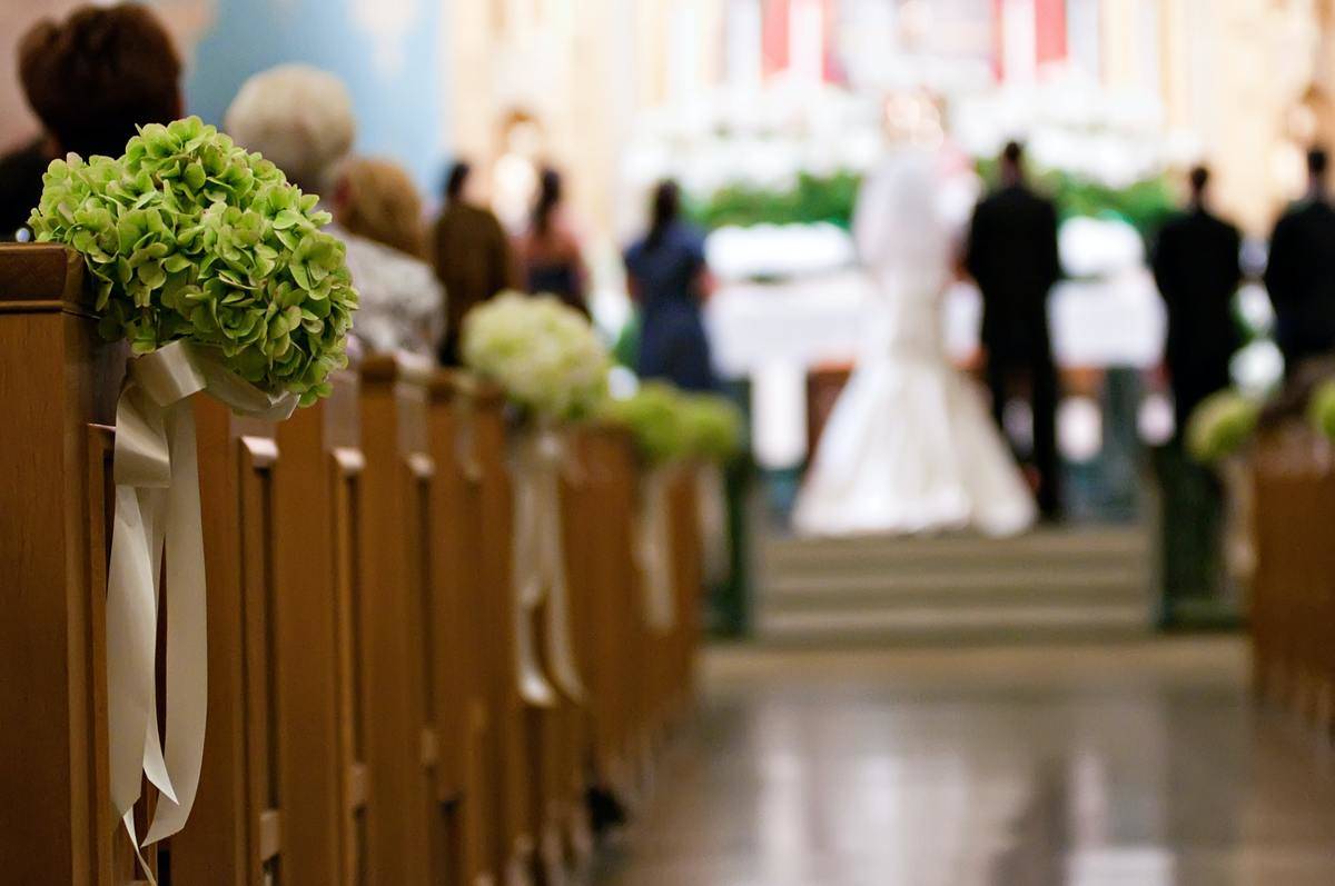 Photo of wedding pew decoration