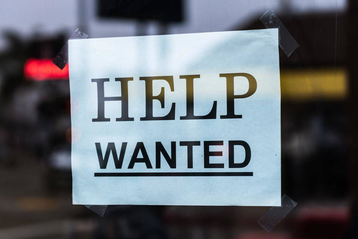 Help Wanted Sign in diner window