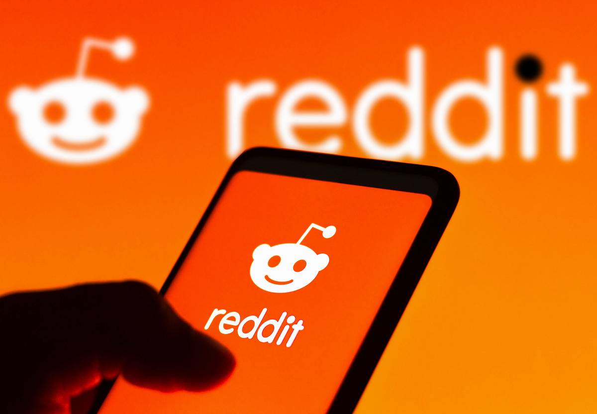 In this photo illustration, the Reddit logo is seen...