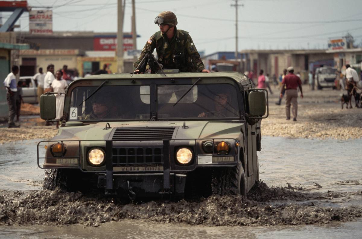Humvee Driving Through Mud