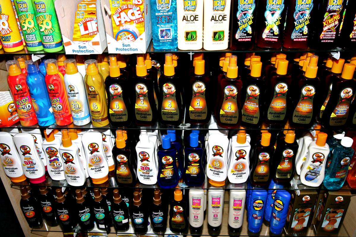 Bottles of sunscreen on sale at The Shirtey, near the beach