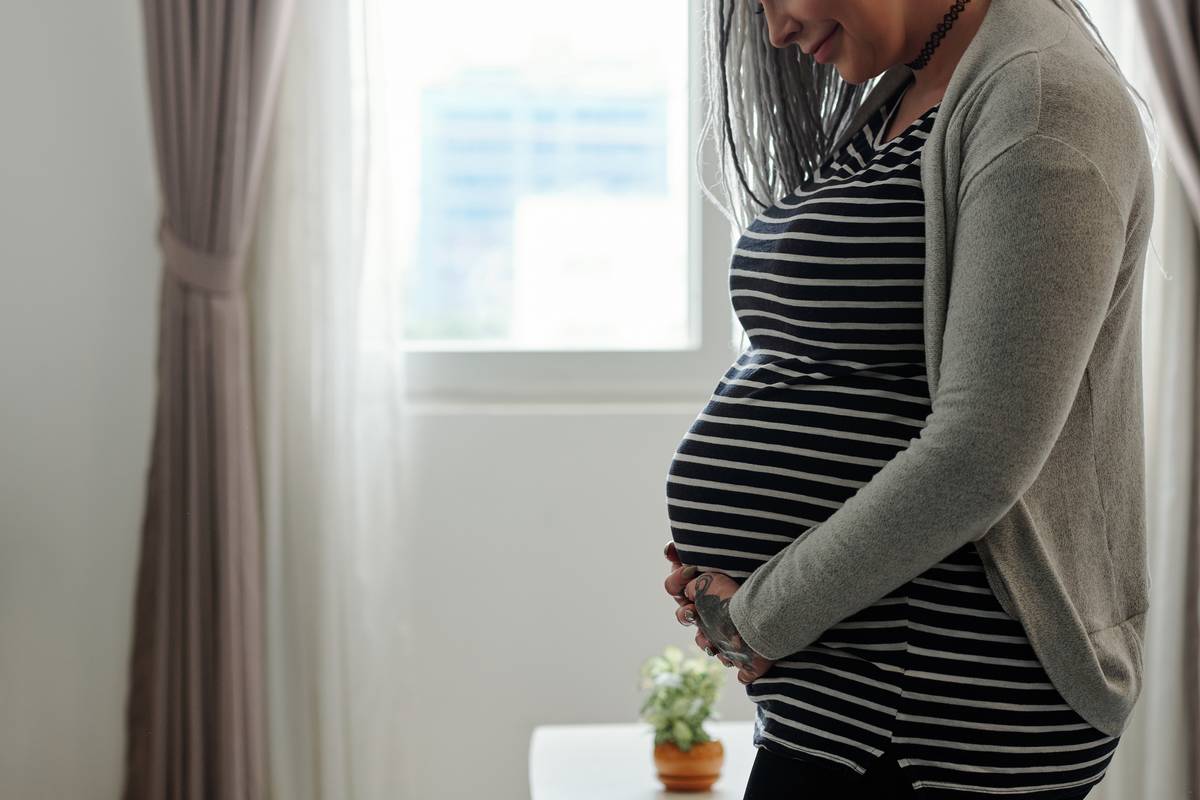 pregnant-woman-with-big-belly-2021-08-29-18-03-59-utc