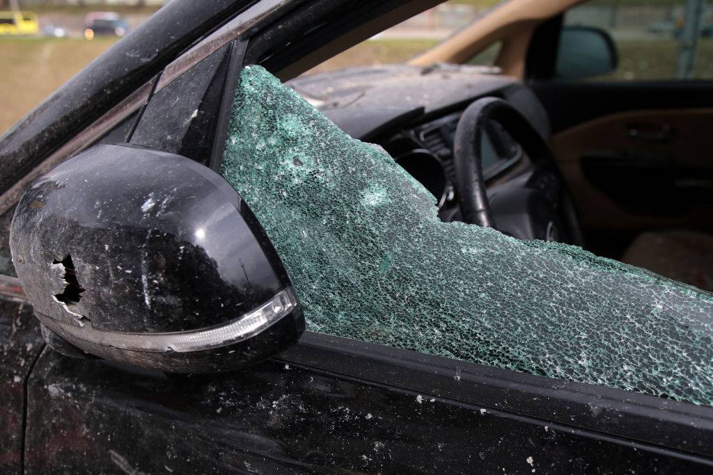 broken window of a car on the driver's side