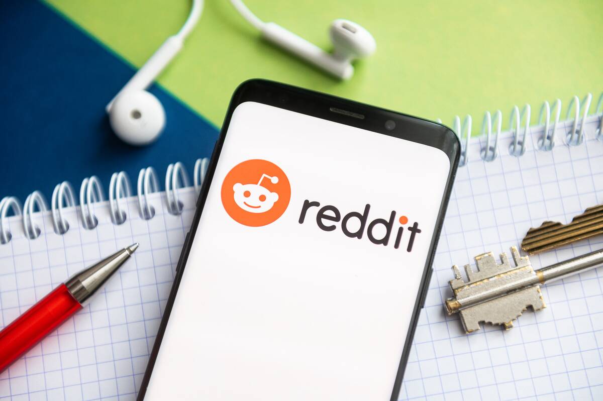 In this photo illustration, a Reddit logo seen displayed on...