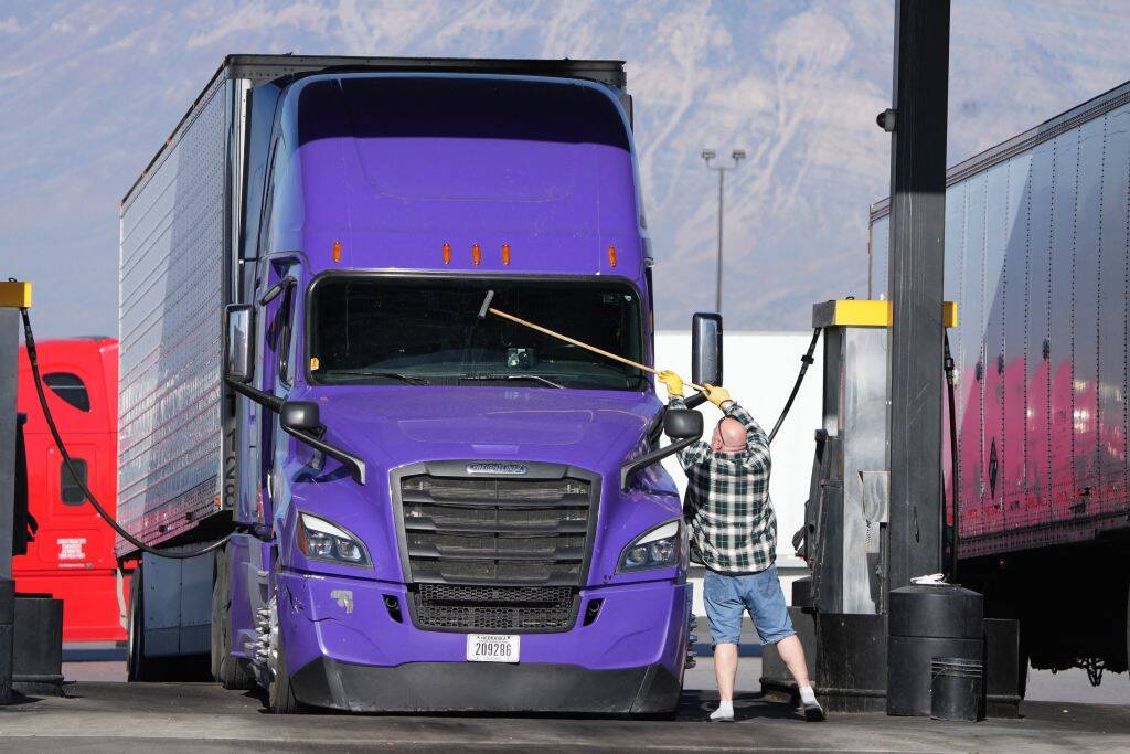 Trucker washing his truck