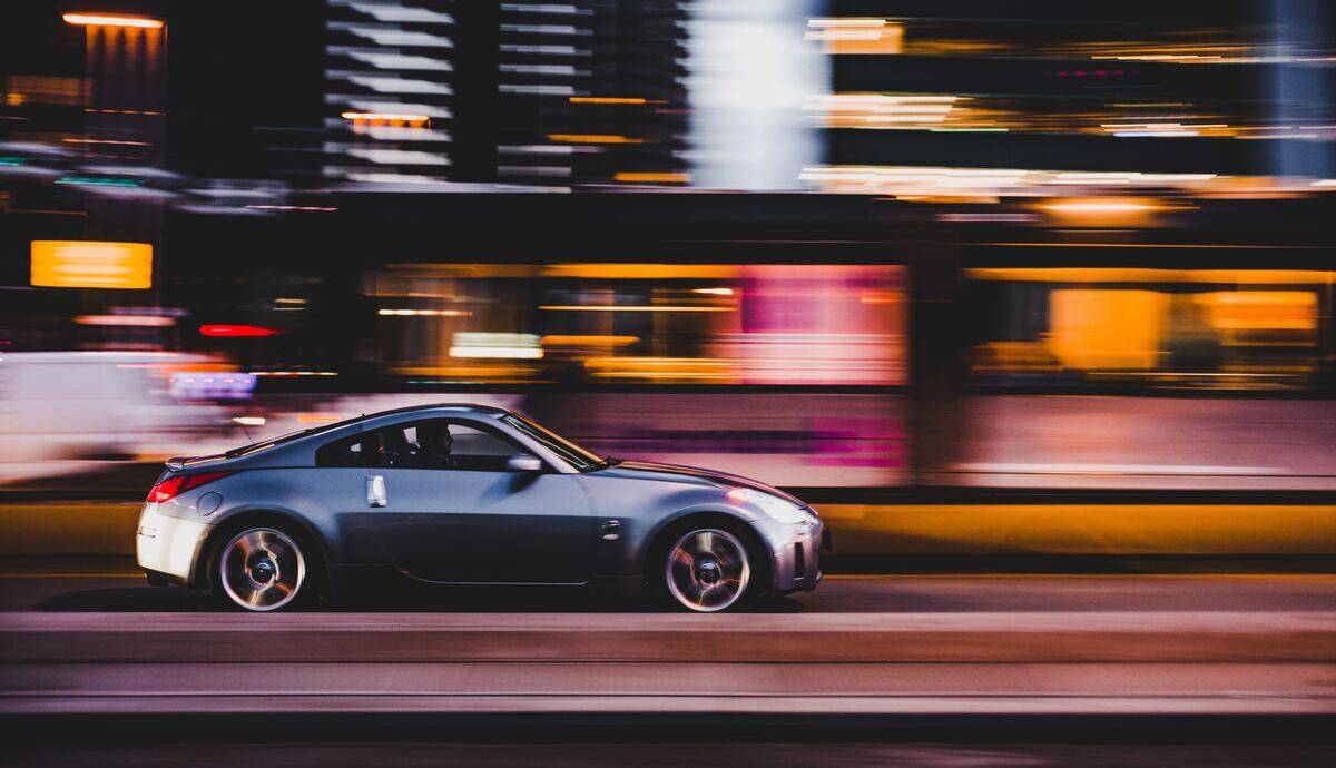 car speeding down a city street