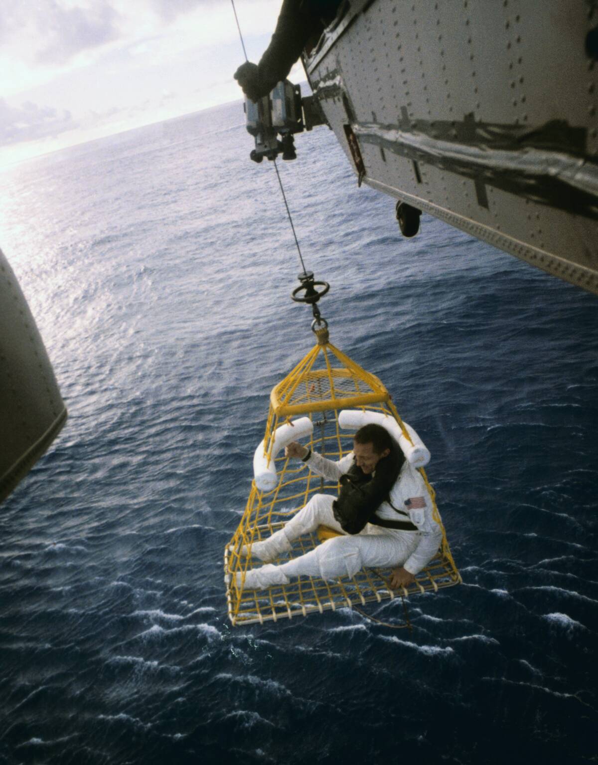 John Swigert Riding in a Rescue Basket