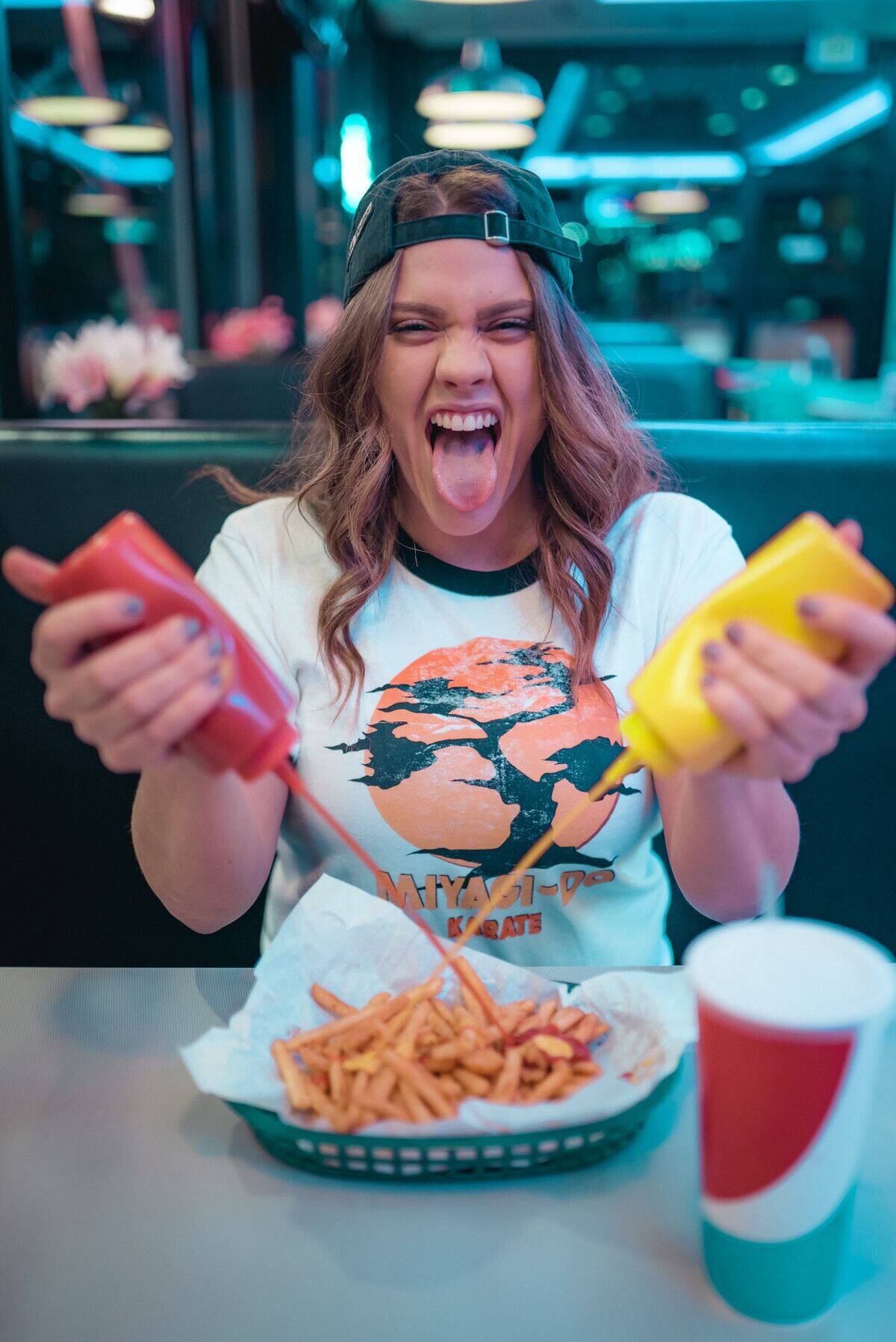 Woman eating fries