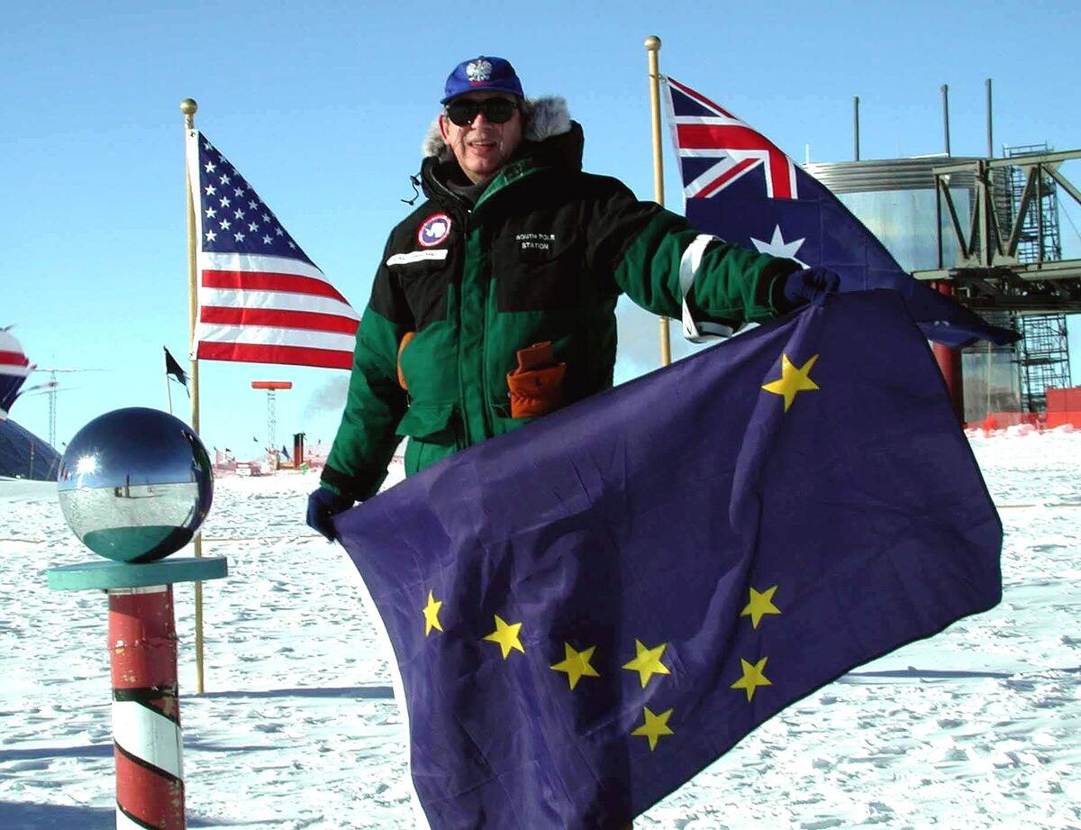 Dr Ronald S Shemenski Stands At The Ceremonial South Pole Holding A