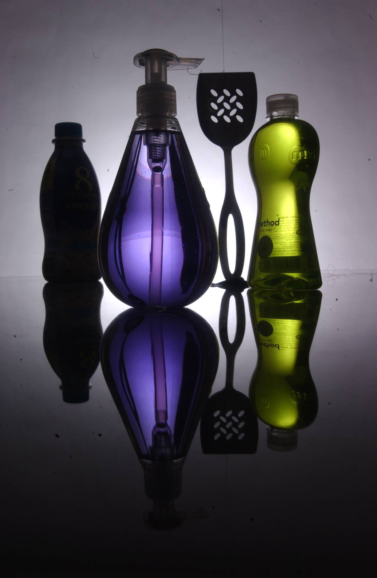 Hand soap and dish soap by Method in design-friendly containers, and a spatula designed by Michael Graves.