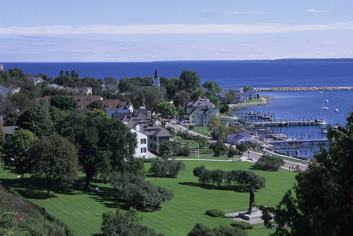 USA, Michigan, Lake Huron, Mackinac Island, View Of Village...