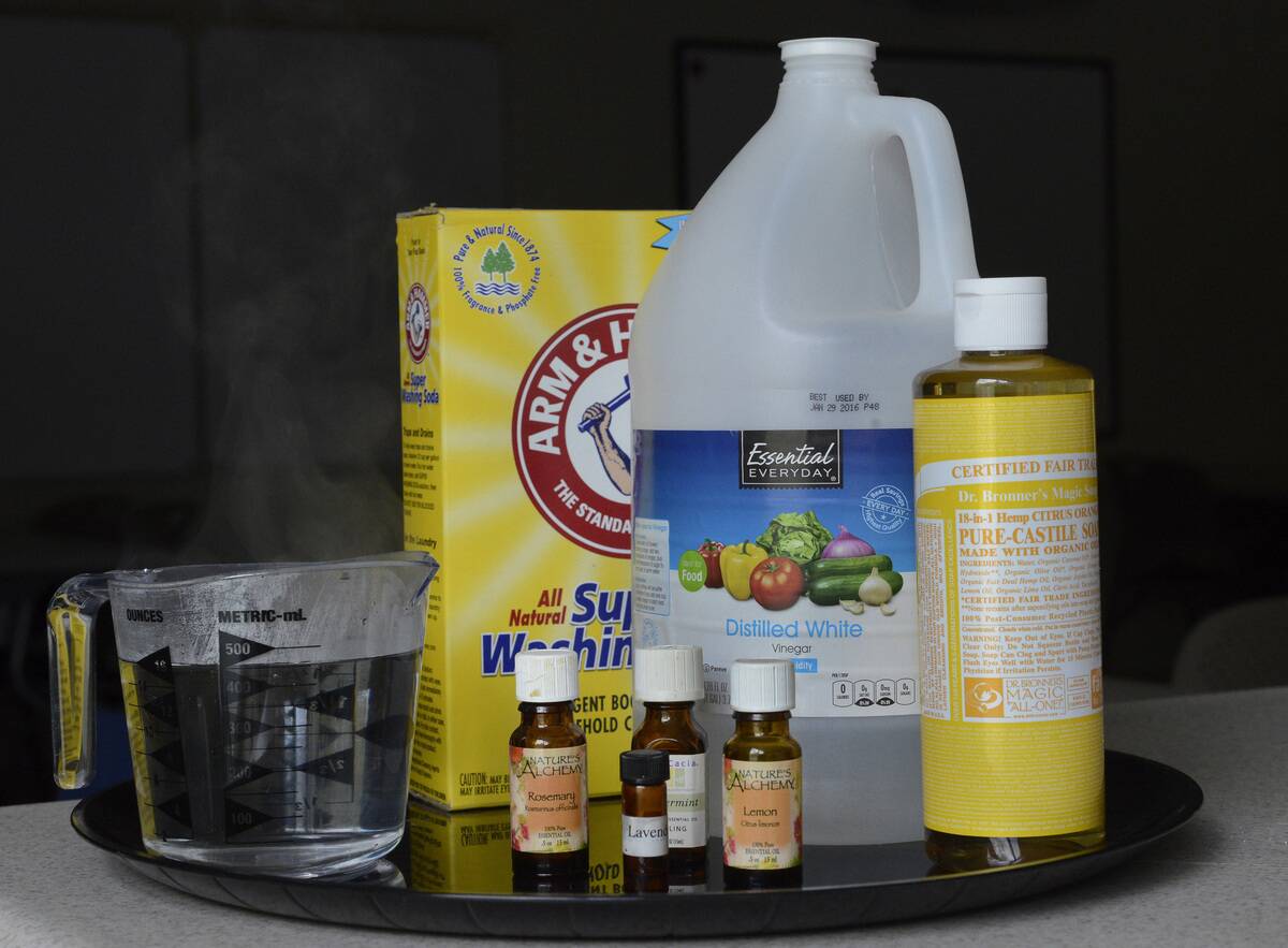 Kathy Savoie prepares and uses an all natural cleaner