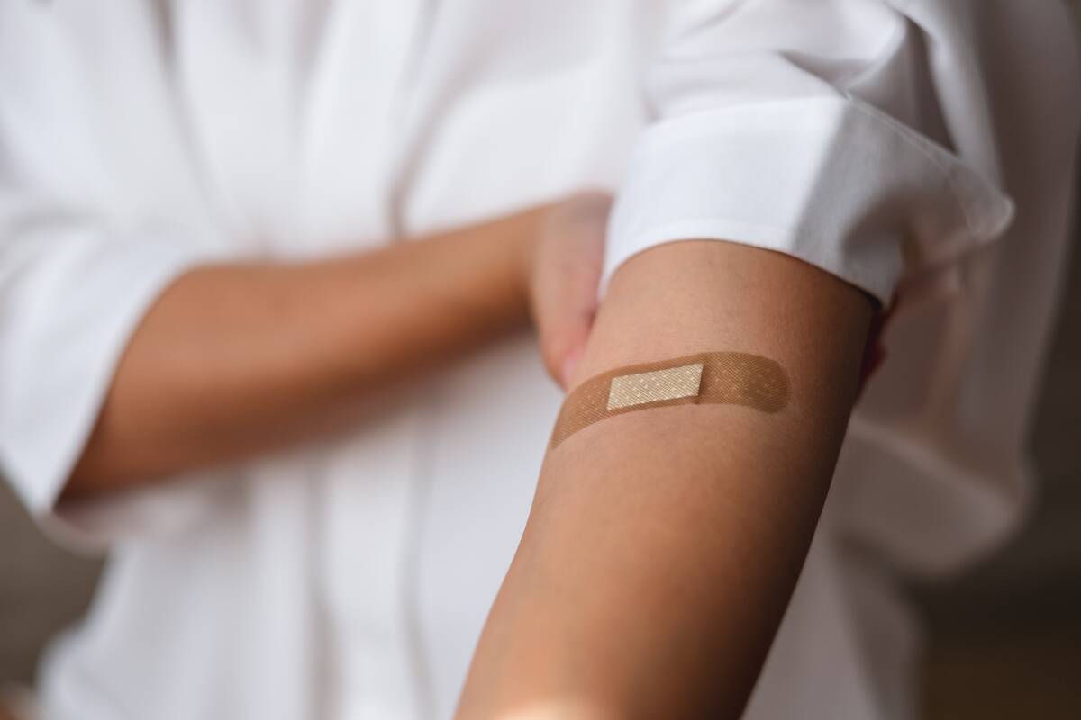 closeup-image-of-a-woman-with-adhesive-bandage-me-2024-11-26-17-27-38-utc