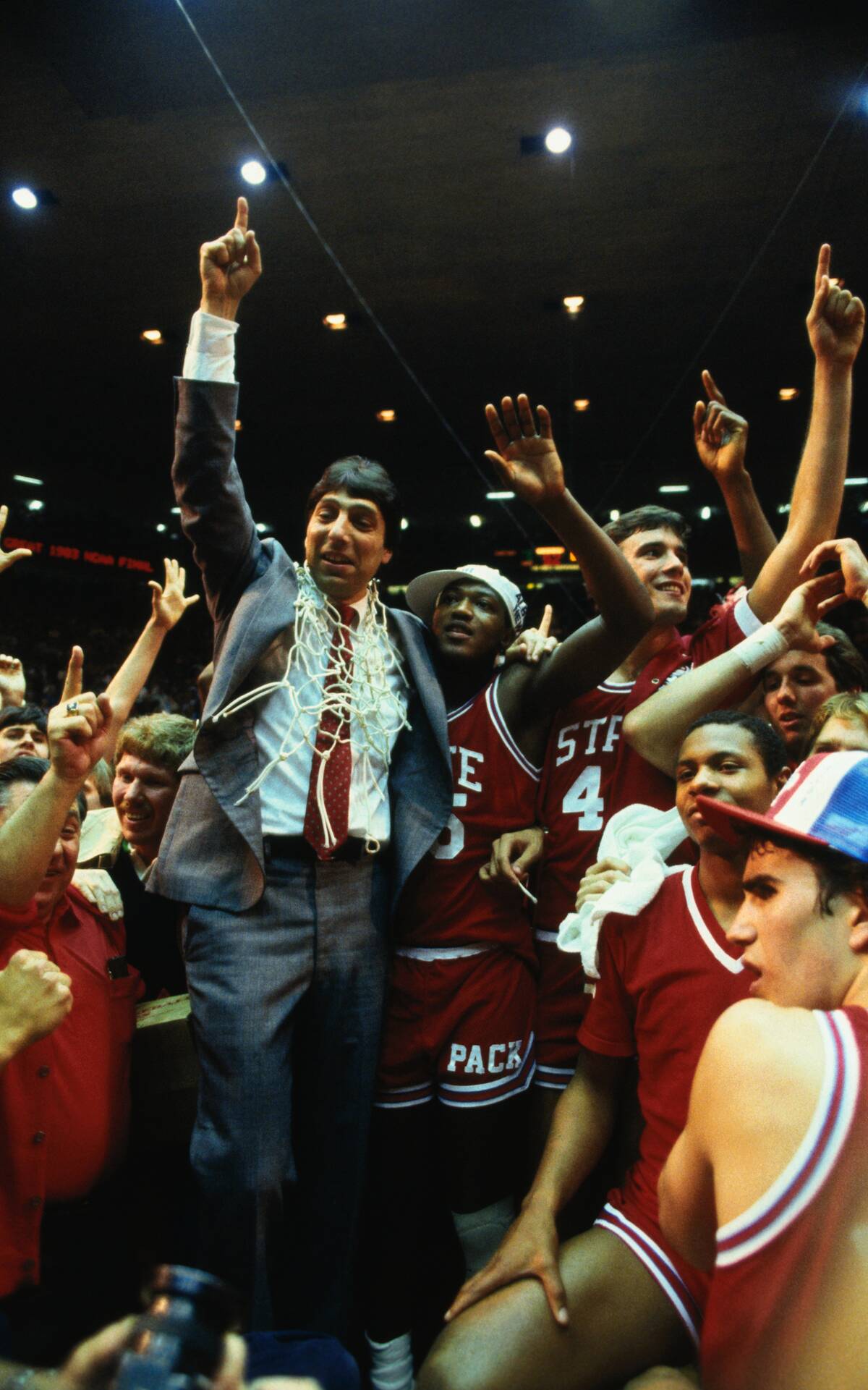 North Carolina State Coach and Players After Winning Basketball Game