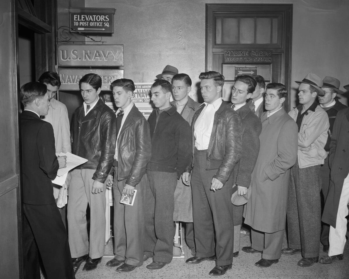 Young Men Waiting Online to Enlist in the Army