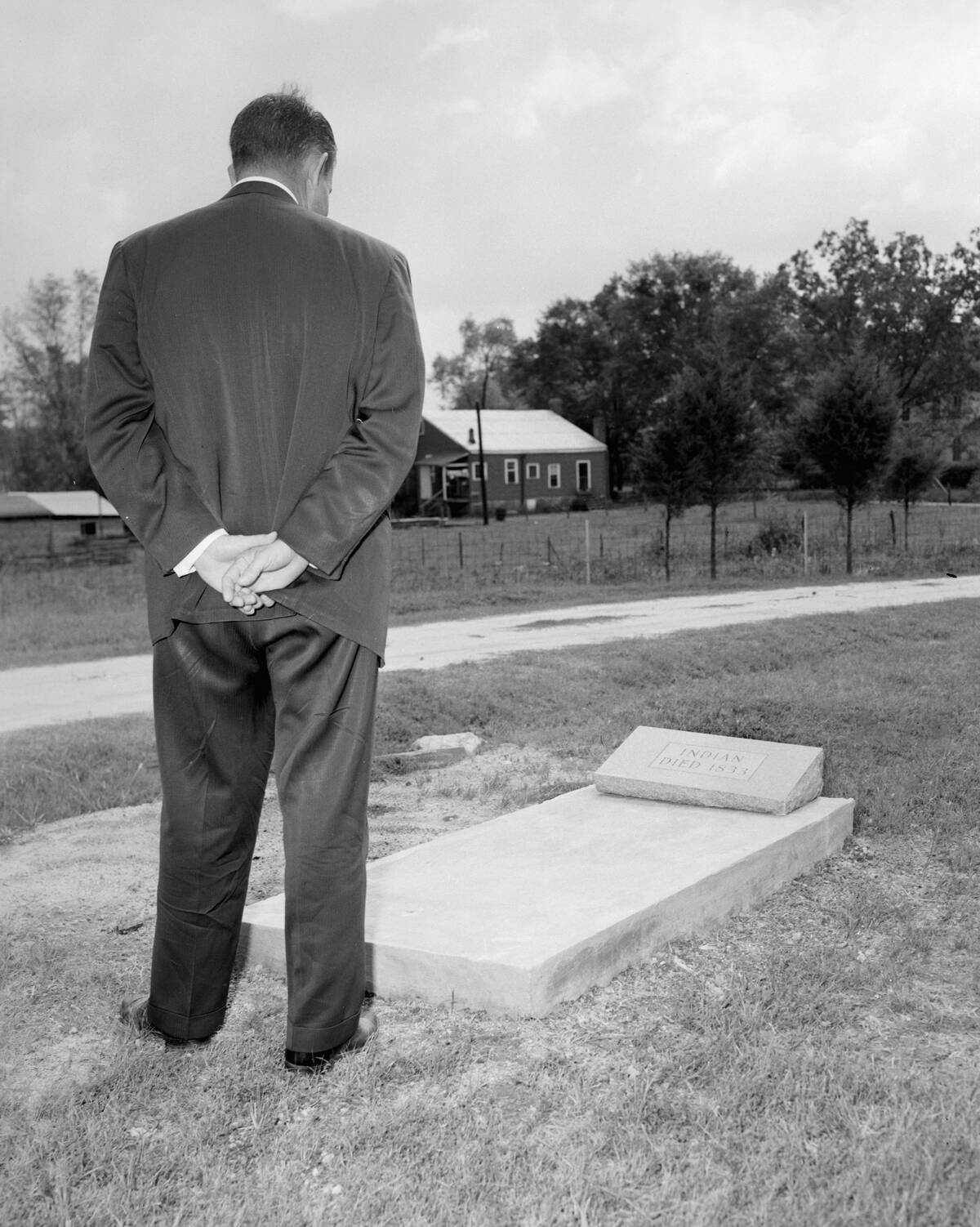 Man at an unmarked Indian grave from 1833.