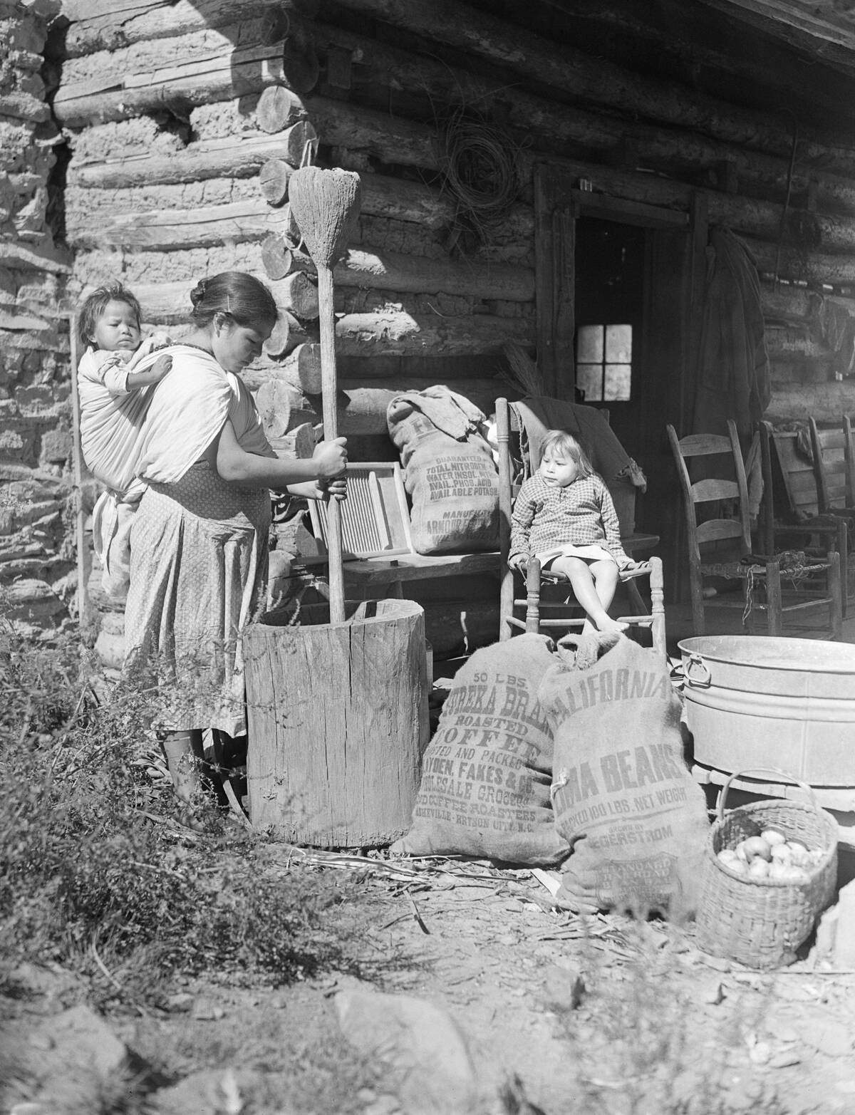 Native American Woman Using Grinder