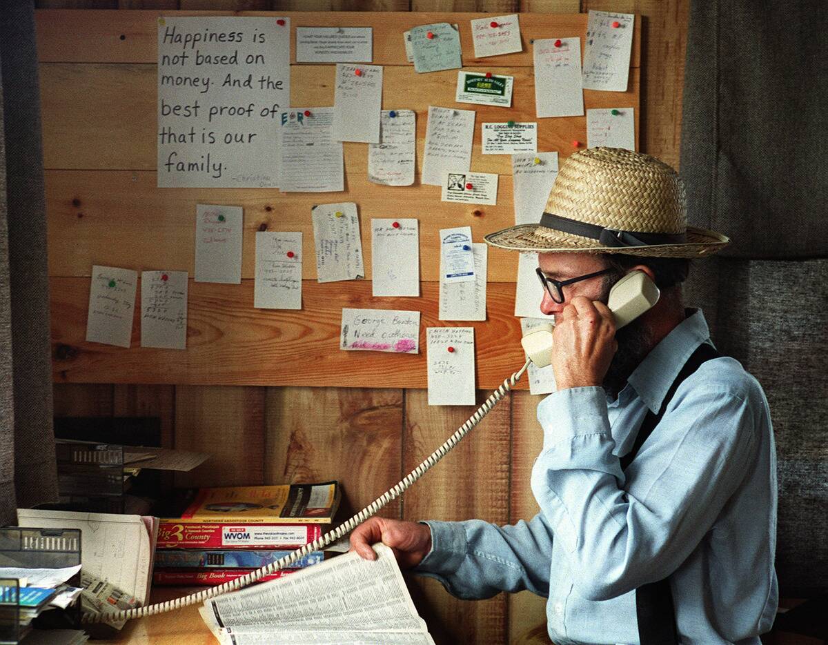 Norman Kauffman talks on the phone with a customer in the Sturdi-Built office in Smyrna. Kauffman, w...