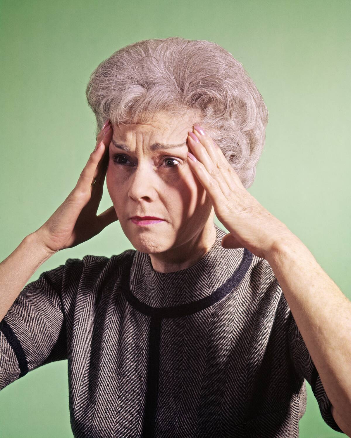 1950s Senior Woman Hands To...