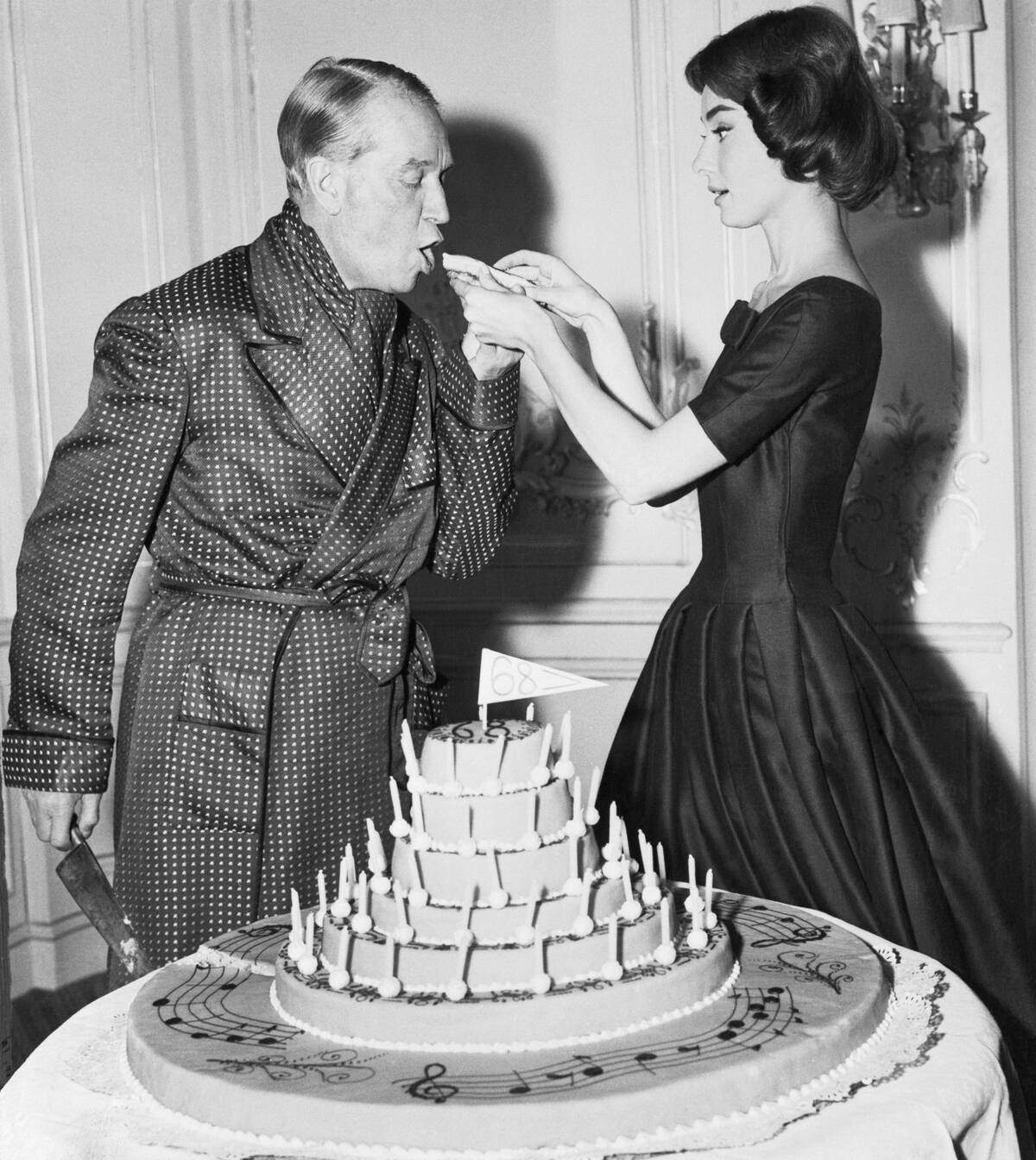 Audrey Hepburn Feeding Maurice Chevalier Birthday Cake