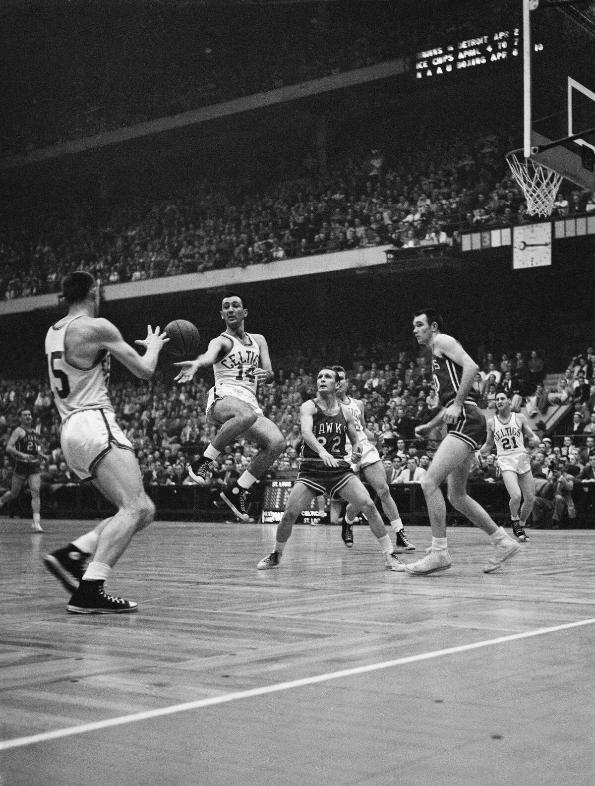 Basketball Player Passing Ball to Teammate