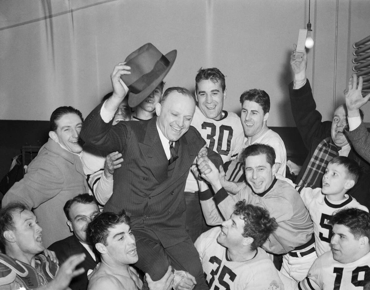 Chicago Bears Hold Aloft Their Owner