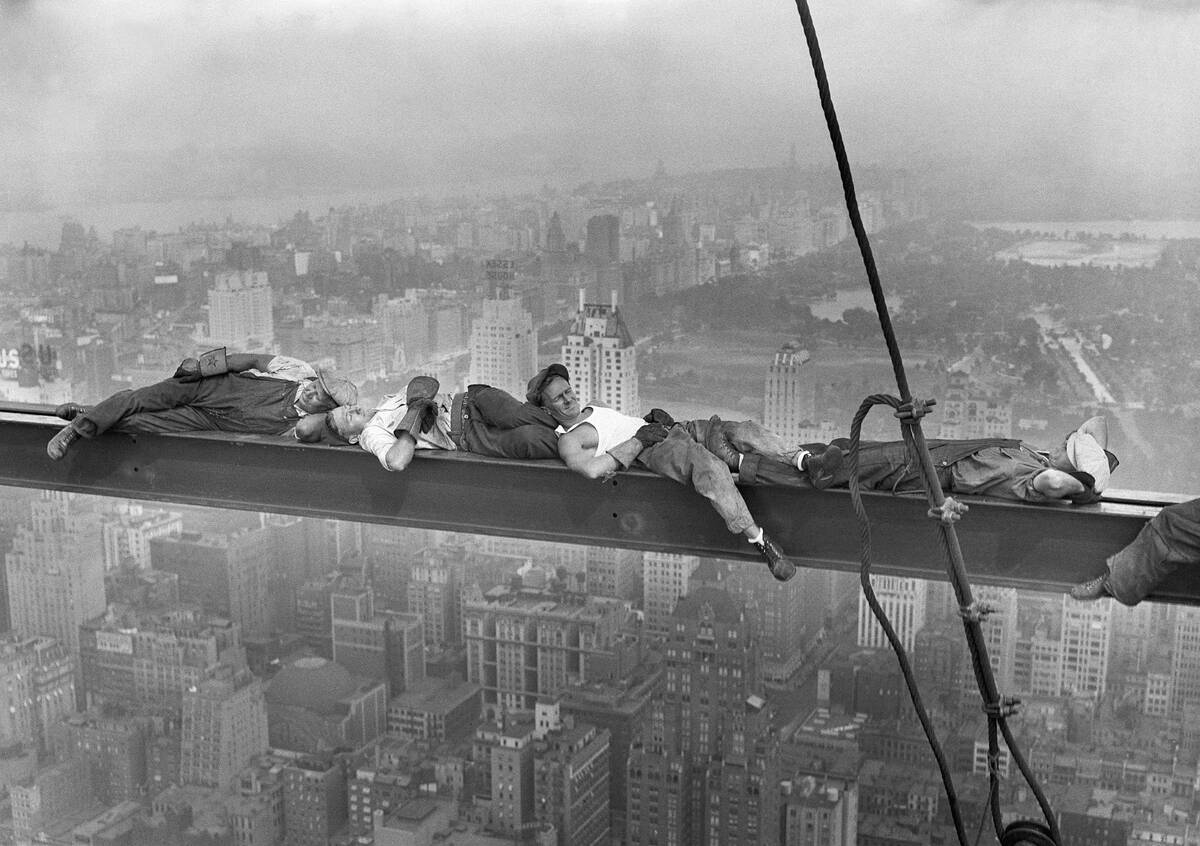 Construction Workers Resting on Steel Beam Above Manhattan