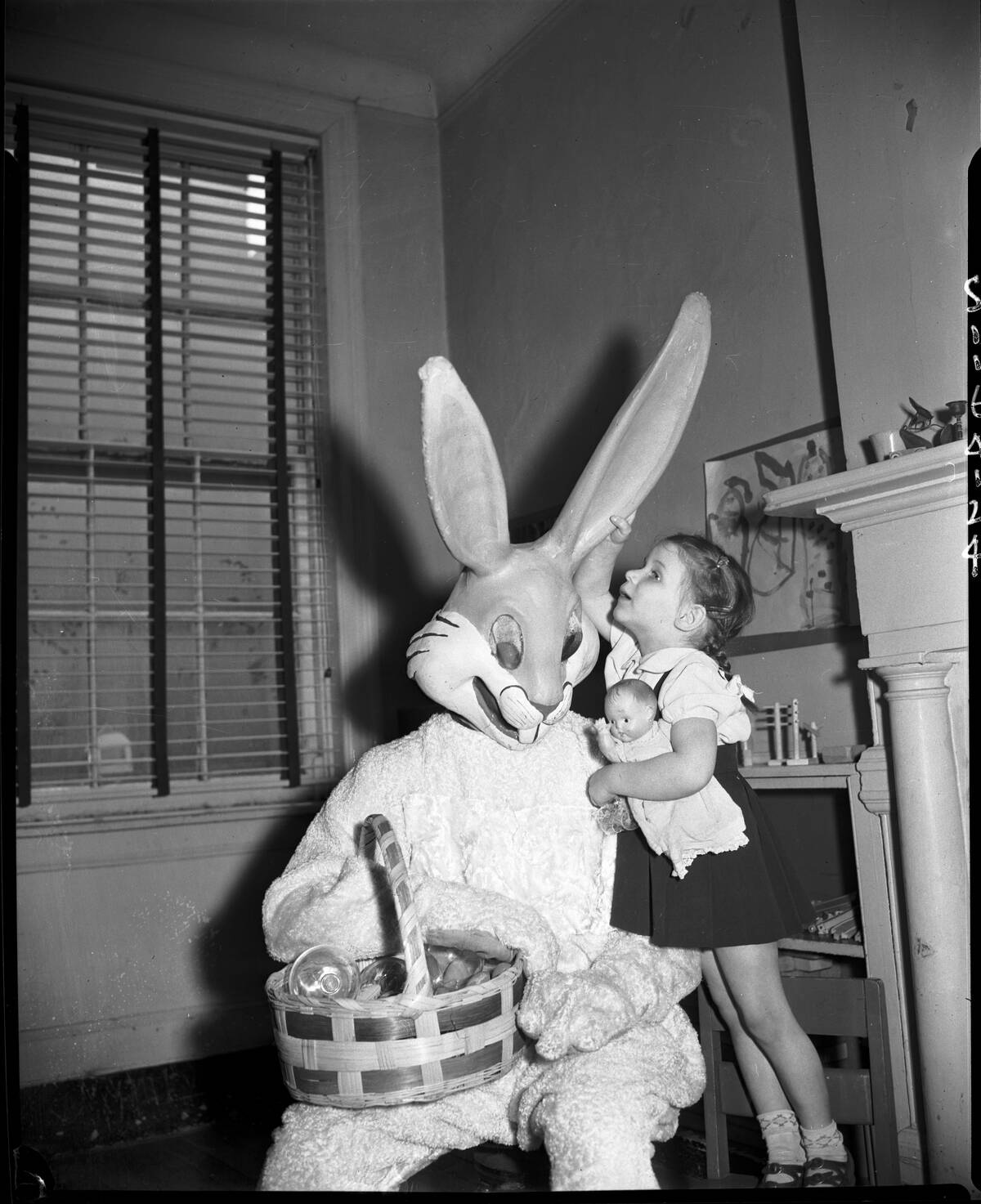 Girl Talking to Man in Rabbit Costume
