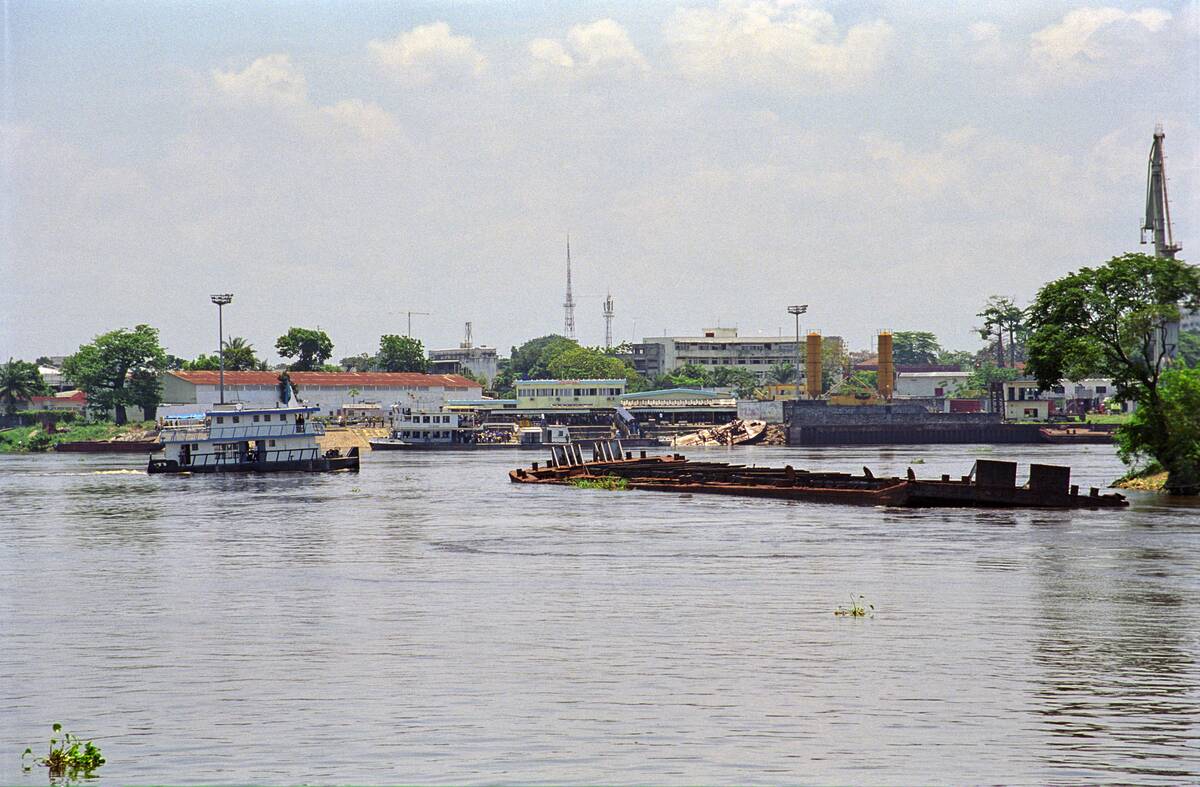 Small Boat And Shipwreck Near Kinshasa