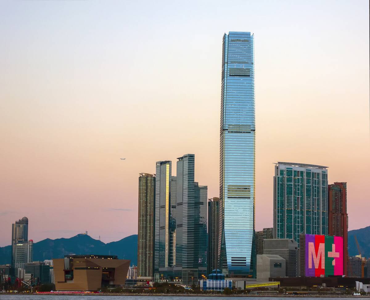 The ICC International Commerce Centre, and Hong Kong's brand new M+ museum of visual culture, Victoria harbor, Hong Kong, China.