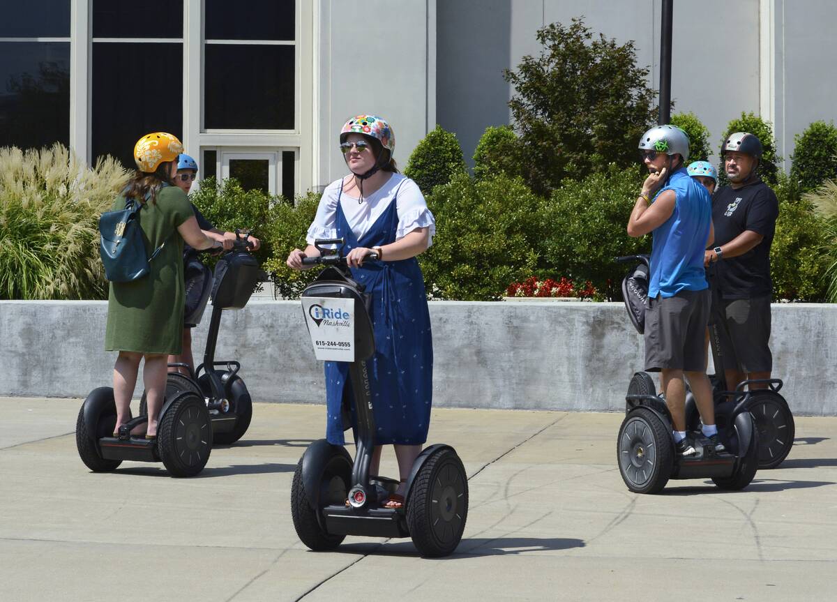 Tourists ride Segway PTs in Nashville, Tennessee USA