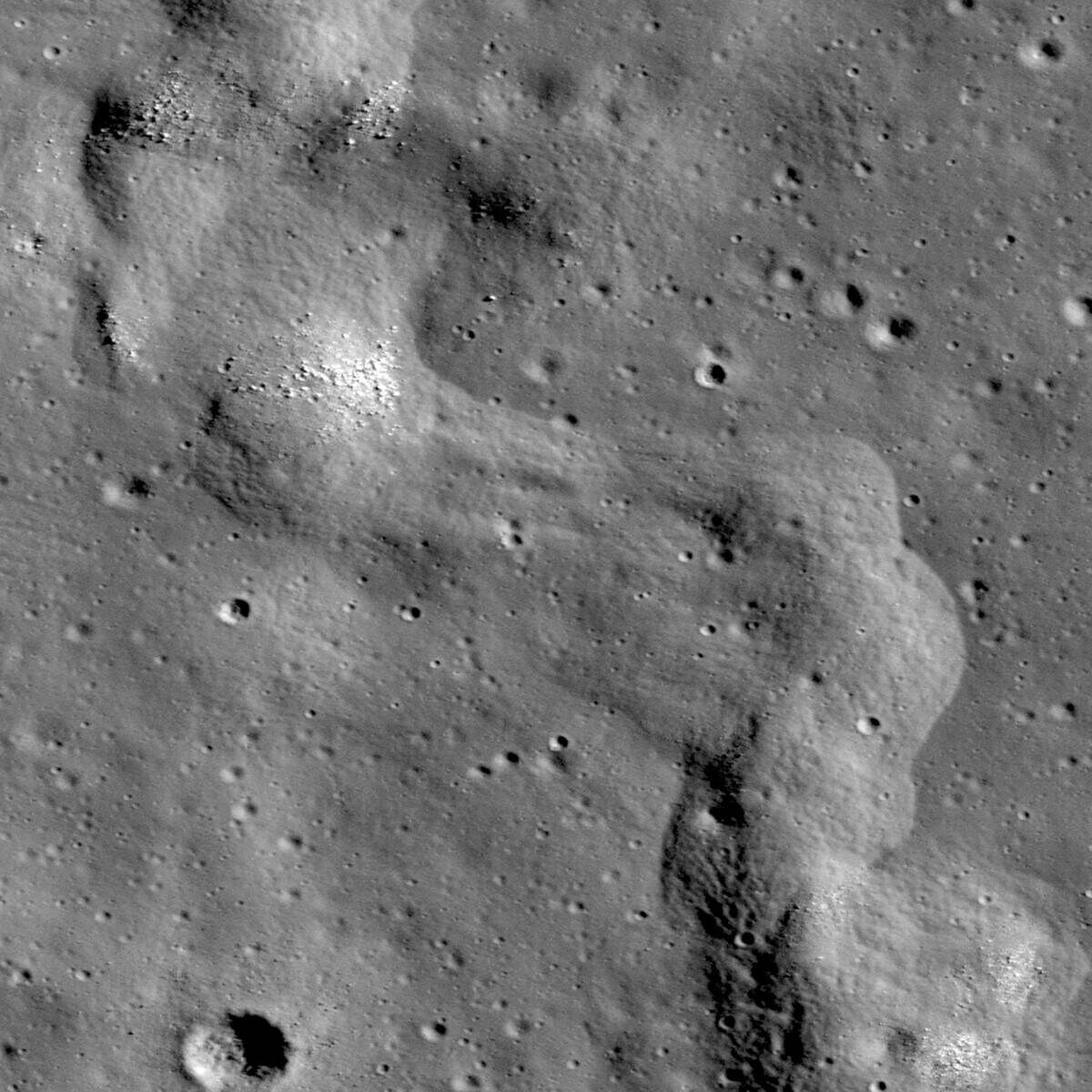 A section of a lobate scarp inside Karrer crater.