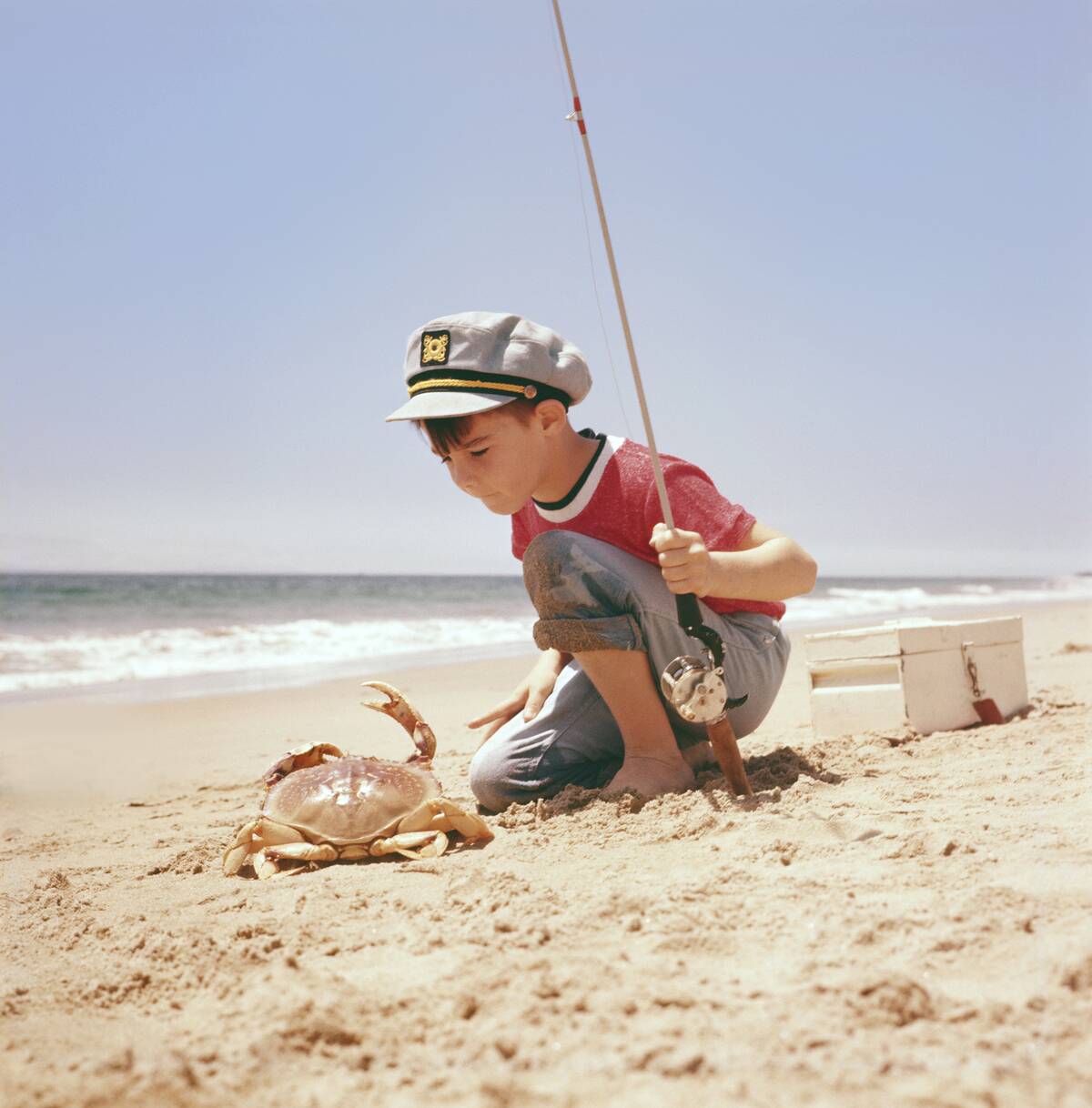 A Small Boy & A Crap On A Beach